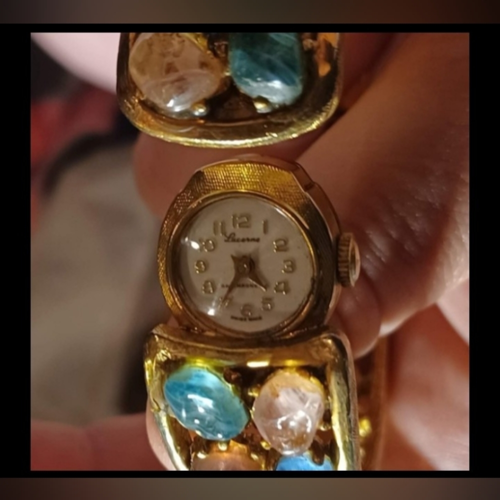 Antique Bangle watch with glass stones.